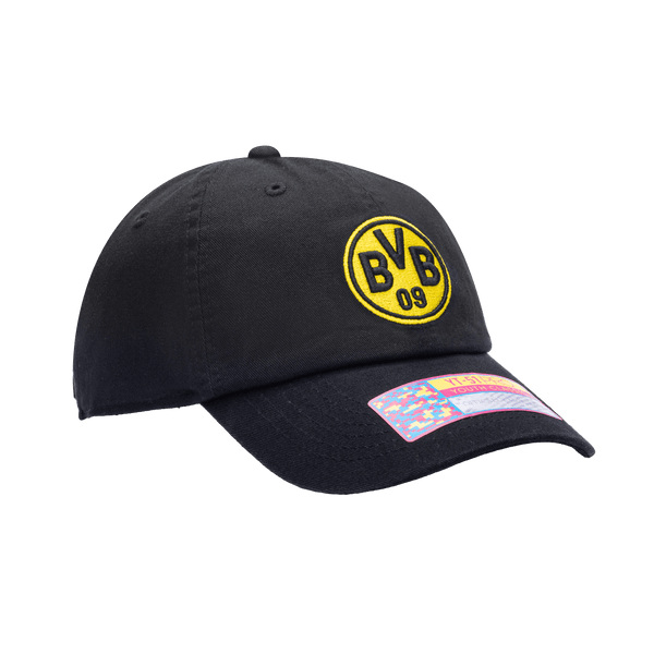 Side view of Borussia Dortmund Bambo Kids Classic hat with low unstructured crown, curved peak brim, and buckle closure, in black.