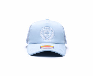 Manchester City Fog Trucker hat with high, constructed crown, curved peak, and snapback closure, in Light Blue